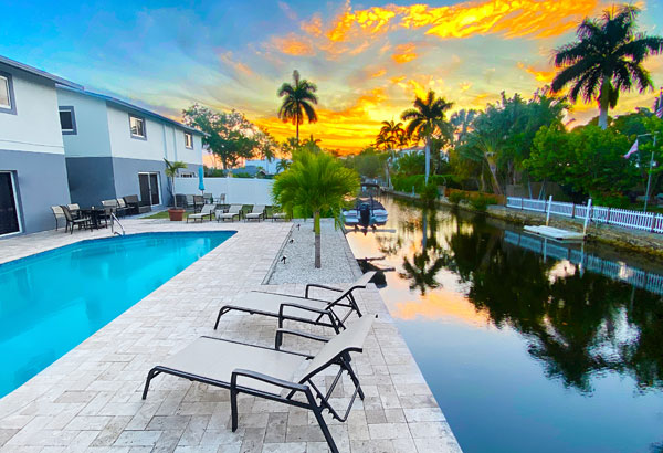 Tarpon Harbor at dusk showing pool and Tarpon River